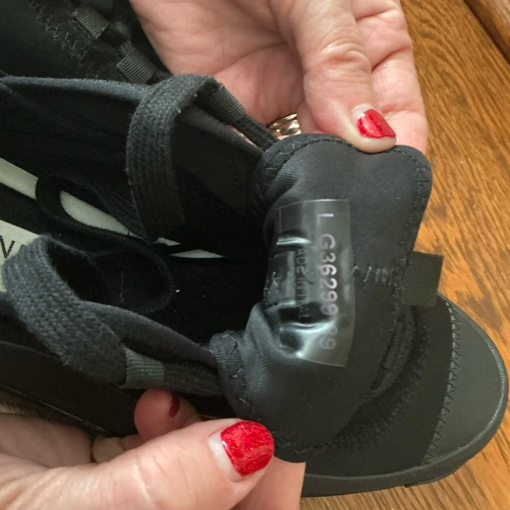 CHANEL Black Women’s Sneakers with Gold Logo